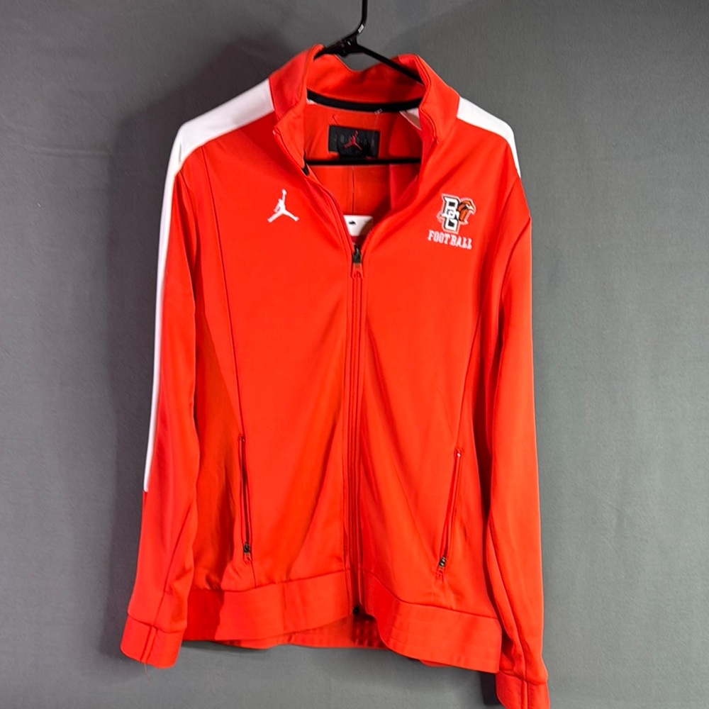 Jordan men’s size large orange and white Jacket.